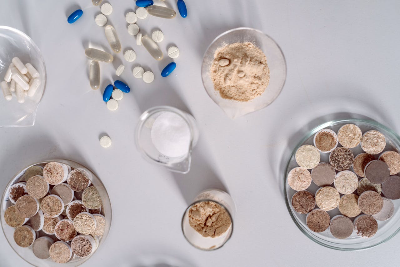 Mastering the First Impression: Your intriguing post title goes here High-angle shot of various pharmaceutical ingredients and pills on a white surface. Ideal for healthcare and science themes.